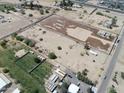 An aerial view reveals the expansive acreage ready to be developed and built into your dream property at 40458 N Prince Ave, San Tan Valley, AZ 85140