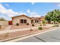 Beautiful home featuring desert landscaping, stone accents, and a paved walkway at 20423 S 186Th St, Queen Creek, AZ 85142