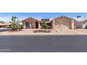 Inviting exterior of home with desert landscaping, featuring a front yard with decorative features at 2363 Leisure World --, Mesa, AZ 85206
