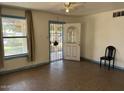 Bright living room showcasing tile floors, neutral paint, and a ceiling fan at 3112 W Taylor St, Phoenix, AZ 85009