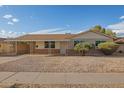 Charming single-story home featuring a covered carport and low-maintenance landscaping at 3632 W Mariposa St, Phoenix, AZ 85019
