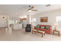 Spacious open-concept living area with tile flooring, perfect for entertaining Gathering and friends at 3724 E Derringer Way, Gilbert, AZ 85297