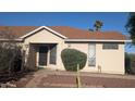 Warm-toned single-story home with a charming front entrance and well-maintained yard in a quiet neighborhood at 537 E Piute Ave, Phoenix, AZ 85024