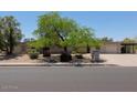 Spacious single-story home featuring a large front yard and a two-car garage at 7232 N 22 Nd St, Phoenix, AZ 85020