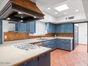 Spacious kitchen featuring ample cabinet space, tile floors and modern appliances at 7232 N 22 Nd St, Phoenix, AZ 85020