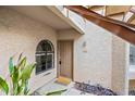 Inviting condo entrance with a cute welcome mat, featuring a modern door and updated finishes at 930 N Mesa Dr # 1079, Mesa, AZ 85201