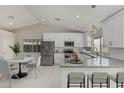 Bright, updated kitchen boasts stainless steel appliances and granite countertops at 1019 W Mohawk Ln, Phoenix, AZ 85027