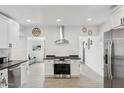 Modern kitchen featuring stainless steel appliances, sleek countertops, and ample cabinet space at 2321 N 30Th St, Phoenix, AZ 85008