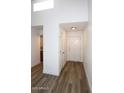 Inviting entryway with wood floors, white walls, and a neutral color palette at 5998 N 78Th St # 222, Scottsdale, AZ 85250
