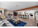The open-concept living space provides space for Gathering and entertaining with easy transition to dining and kitchen at 10245 N 34Th Pl, Phoenix, AZ 85028