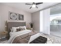 Cozy bedroom with stylish decor, comfortable bedding, and natural light, with outside access at 1825 W Ray Rd # 2132, Chandler, AZ 85224
