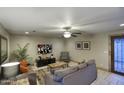 Cozy living room features modern decor, tile floors, and comfortable seating at 4008 N 85Th St, Scottsdale, AZ 85251