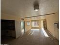 Cozy living room with tiled floors and a light fixture, perfect for relaxation and entertaining guests at 4310 N 42Nd Pl, Phoenix, AZ 85018