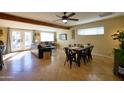 Open concept living and dining area with stylish furnishings and great natural lighting at 6901 E Portland St, Scottsdale, AZ 85257