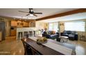 Open concept kitchen and living area with modern amenities and comfortable seating at 6901 E Portland St, Scottsdale, AZ 85257