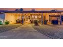Covered outdoor patio perfect for entertaining with string lights at 5402 E Larkspur Dr, Scottsdale, AZ 85254