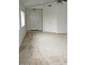 Bright living room featuring vaulted ceilings, carpet floors, and a closet at 10752 W Rio Vista Ln, Avondale, AZ 85323