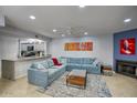 Spacious living room with an open layout, fireplace, comfortable seating, and modern accents at 2142 E Turney Ave # 9, Phoenix, AZ 85016