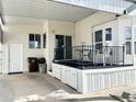 Inviting, covered porch featuring outdoor seating and storage; convenient for outdoor living at 272 S Cinnabar Dr, Apache Junction, AZ 85119