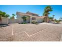 A well-kept two-story home featuring desert landscaping and a classic tile roof at 4319 E Tanglewood Dr, Phoenix, AZ 85048