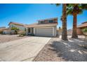 Attractive two-story house with desert landscaping, a well-maintained driveway, and a classic tile roof at 4319 E Tanglewood Dr, Phoenix, AZ 85048