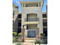 Exterior shot featuring a tower with a water feature at 7601 E Indian Bend Rd # 1049, Scottsdale, AZ 85250