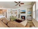 Cozy living room with fireplace, comfortable seating, and a flat-screen TV, creating a welcoming atmosphere at 7601 E Indian Bend Rd # 1049, Scottsdale, AZ 85250