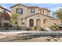 Charming two-story home with a welcoming entrance and manicured front yard landscaping at 1255 N Banning --, Mesa, AZ 85205