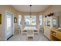 Bright breakfast nook with large windows, perfect for enjoying morning meals at 21003 N Circle Cliffs Dr, Surprise, AZ 85387