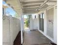 Enclosed patio with white cinder block walls offering a private outdoor space at 2133 W Turney Ave # C88, Phoenix, AZ 85015