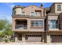 Beautiful multi-level townhome with a covered balcony and attached two-car garage at 3935 E Rough Rider Rd # 1252, Phoenix, AZ 85050