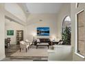 Bright living room featuring vaulted ceilings, neutral colors, lots of natural light, and comfortable seating at 6765 E Duane Ln, Scottsdale, AZ 85266