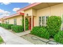 Charming single-story home with a well-maintained lawn and desert landscaping at 10040 W Royal Oak Rd # N, Sun City, AZ 85351