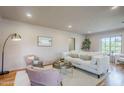 Bright living room with plush seating, modern decor, and inviting atmosphere at 1551 W Vernon Ave, Phoenix, AZ 85007