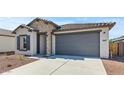 Close-up of the garage of the home at 23417 W Burton Ave, Buckeye, AZ 85326