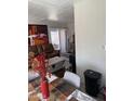 Inviting living room with sliding glass door and adjacent dining area, featuring cozy seating and modern decor at 4065 E University Dr # 242, Mesa, AZ 85205