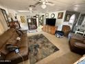 Cozy living room featuring comfortable seating and a view into other rooms at 9501 E Broadway Rd # 21, Mesa, AZ 85208