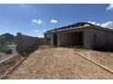 New construction home featuring a driveway ready for concrete, landscaping, and block fence at 2300 E Spur Dr, San Tan Valley, AZ 85140