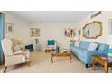 Cozy living room with stylish furniture and a decorative gold mirror at 4613 E Shangri La Rd --, Phoenix, AZ 85028