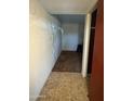 Entryway with tiled floors transitioning to carpeted space at 5833 W Rosewood Ln, Phoenix, AZ 85031
