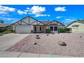 Welcoming single-Gathering home with a brick-accented front and well-maintained yard at 6160 E Inglewood St, Mesa, AZ 85205