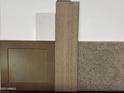 Interior design selection featuring cabinet, counter, flooring, and carpet samples at 823 W Riparian Dr, San Tan Valley, AZ 85140