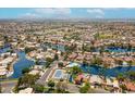 Expansive aerial view of the community featuring a network of lakes, homes, and recreational areas at 1601 E Cindy E St, Chandler, AZ 85225