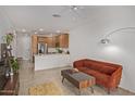 Bright, open living space seamlessly connects the living area to the modern kitchen at 2511 W Queen Creek Rd # 378, Chandler, AZ 85248