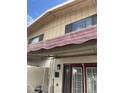 Covered patio area with awning and a view of windows and doors leading inside at 5425 N Black Cyn Hwy, Phoenix, AZ 85015