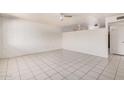 Spacious living room with tile flooring offers a clean and versatile living space at 5529 W Virginia Ave, Phoenix, AZ 85035