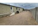 Home with gravel backyard, patio and grill at 10231 E Illini St, Mesa, AZ 85208