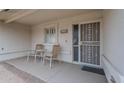 Inviting front porch with seating, providing a cozy entrance to the home at 11012 E Knowles Ave, Mesa, AZ 85209