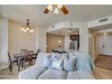 Comfortable living room open to the dining area and kitchen bar at 140 E Rio Salado Pkwy # 402, Tempe, AZ 85281