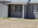 Up close look at the front exterior of the home with a security door and view of the house number at 1630 E Catalina Dr, Phoenix, AZ 85016